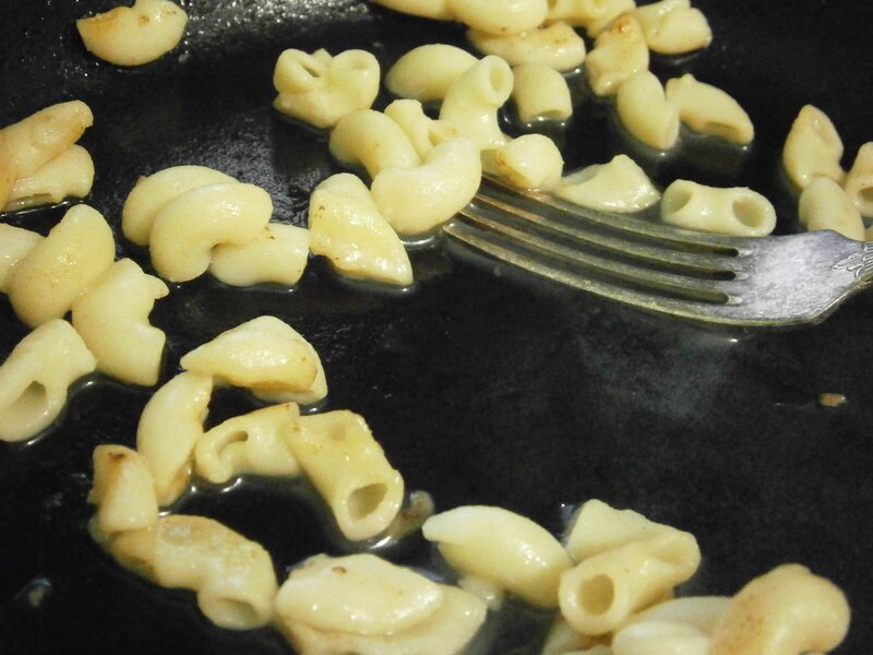 Macaroni cooking in a pan