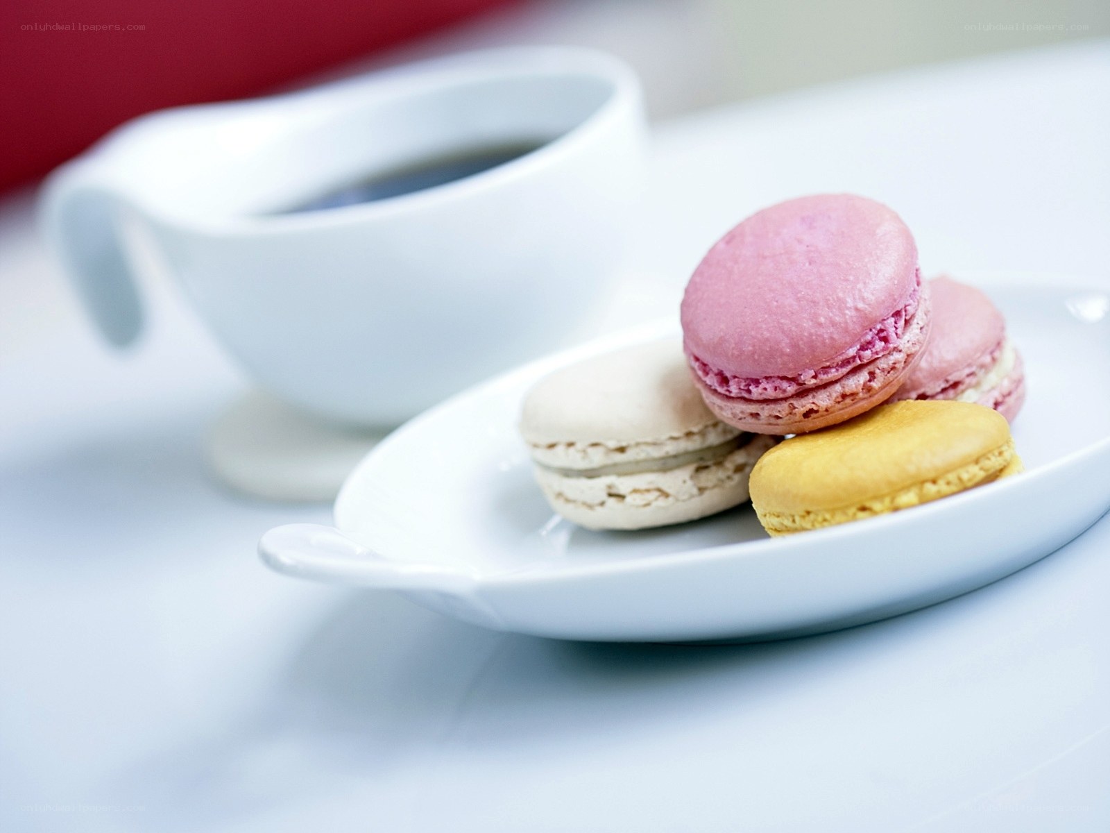 macarons and coffee on a plate