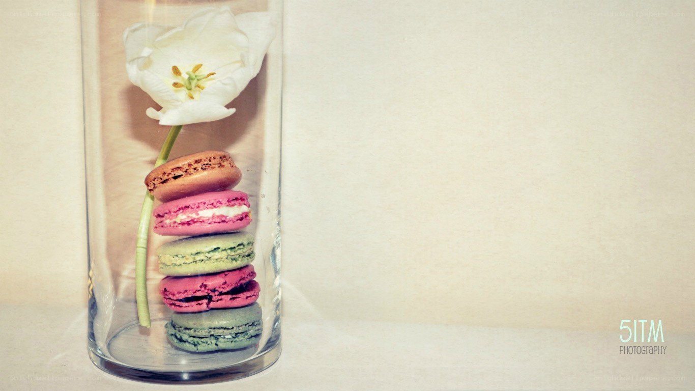 macarons and flower in a vase