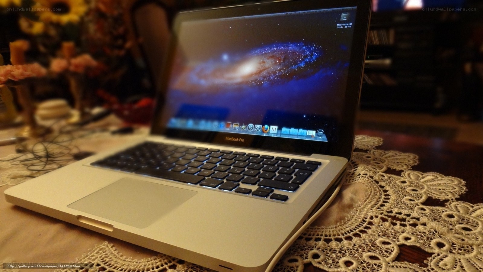 MacBook Pro on lace table