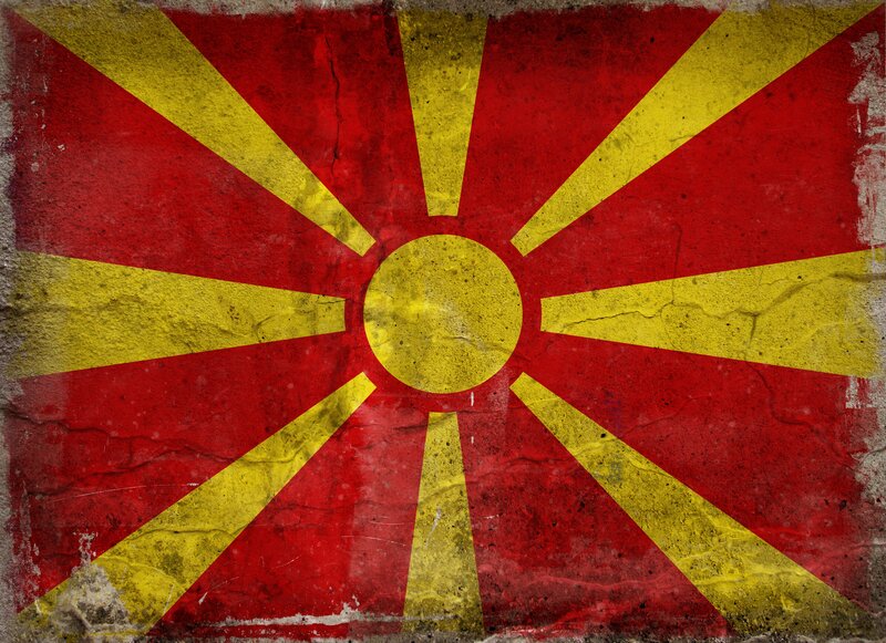 Macedonian flag on weathered wall