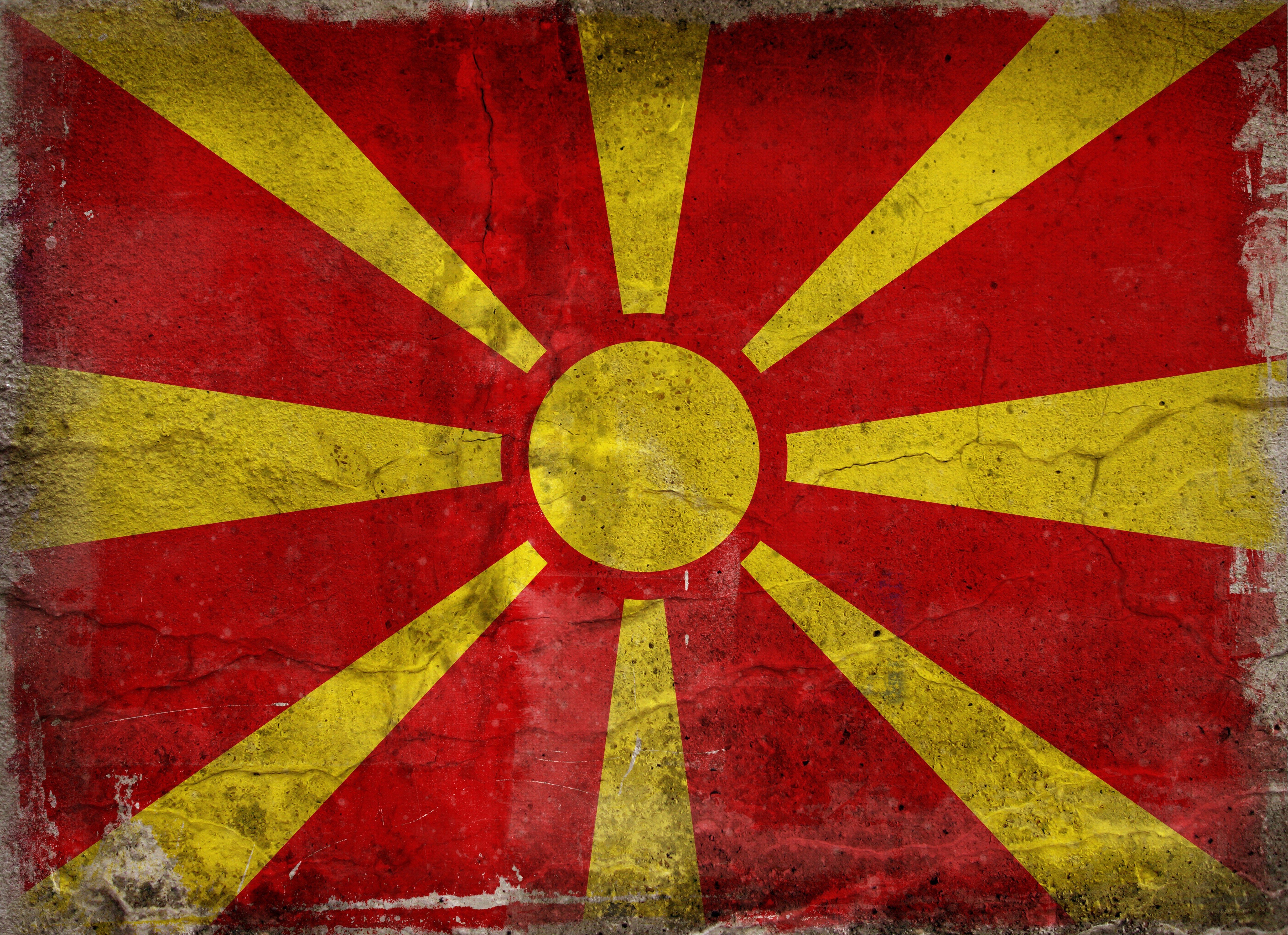 Macedonian flag on weathered wall