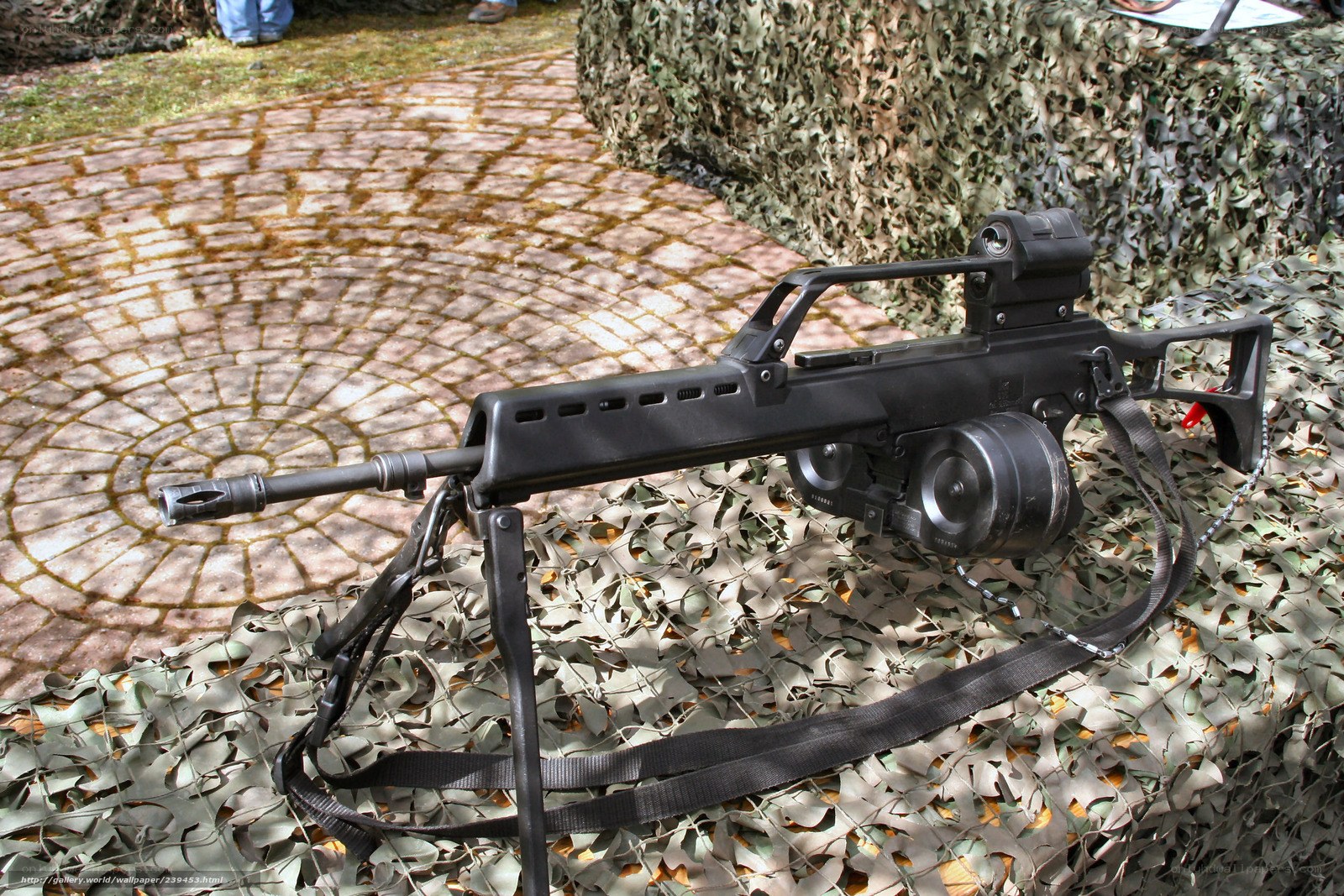 Machine gun on camouflage net