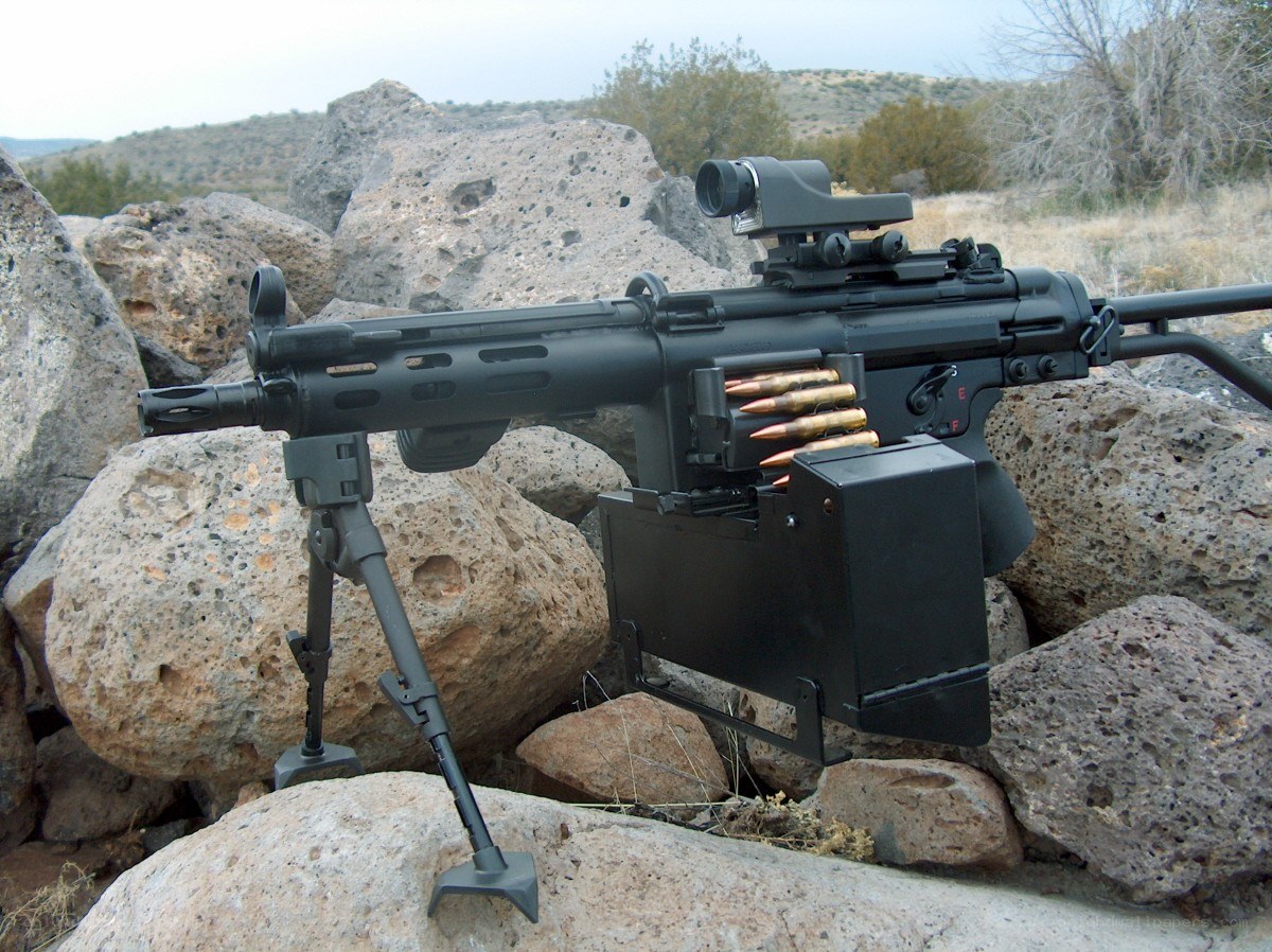 machine gun on rocks