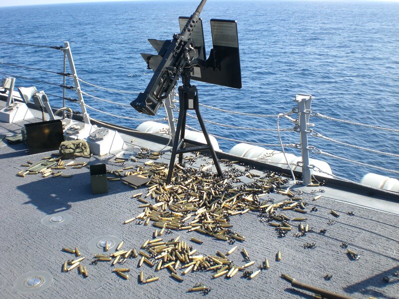 Machine gun on ship deck