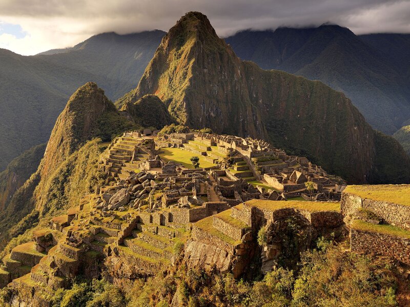 Machu Picchu Ruins — Green, Dramatic, Afternoon, Photograph, Mountains, Stone Structures, Terraces