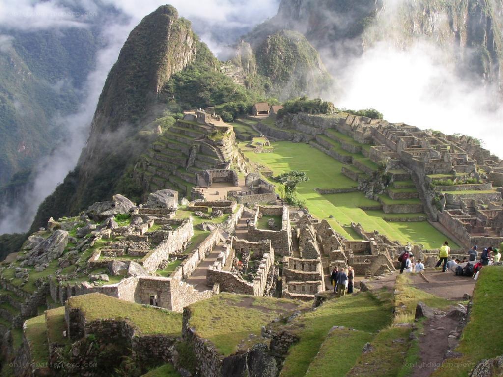 Machu Picchu ruins in clouds