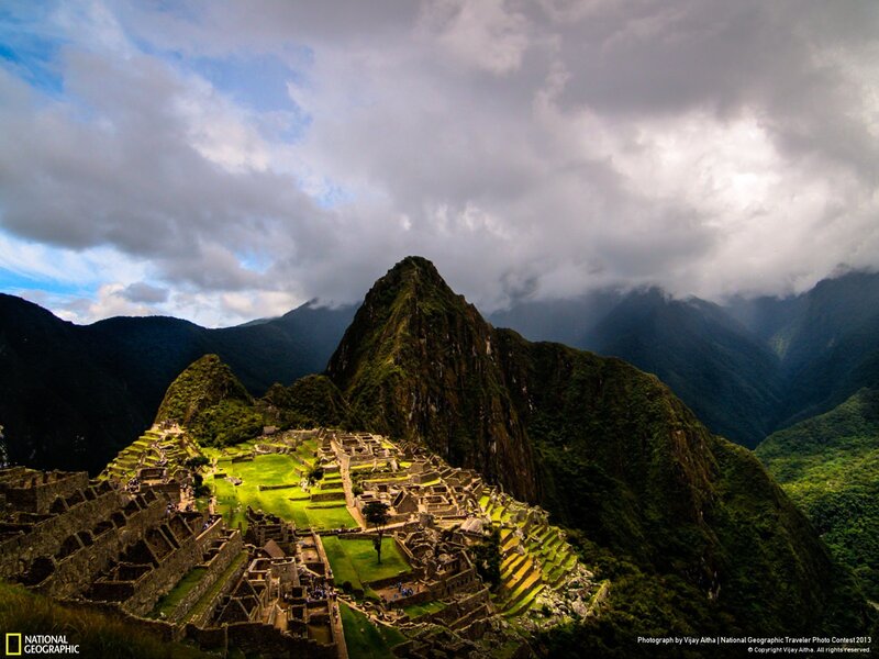 Machu Picchu under cloudy sky