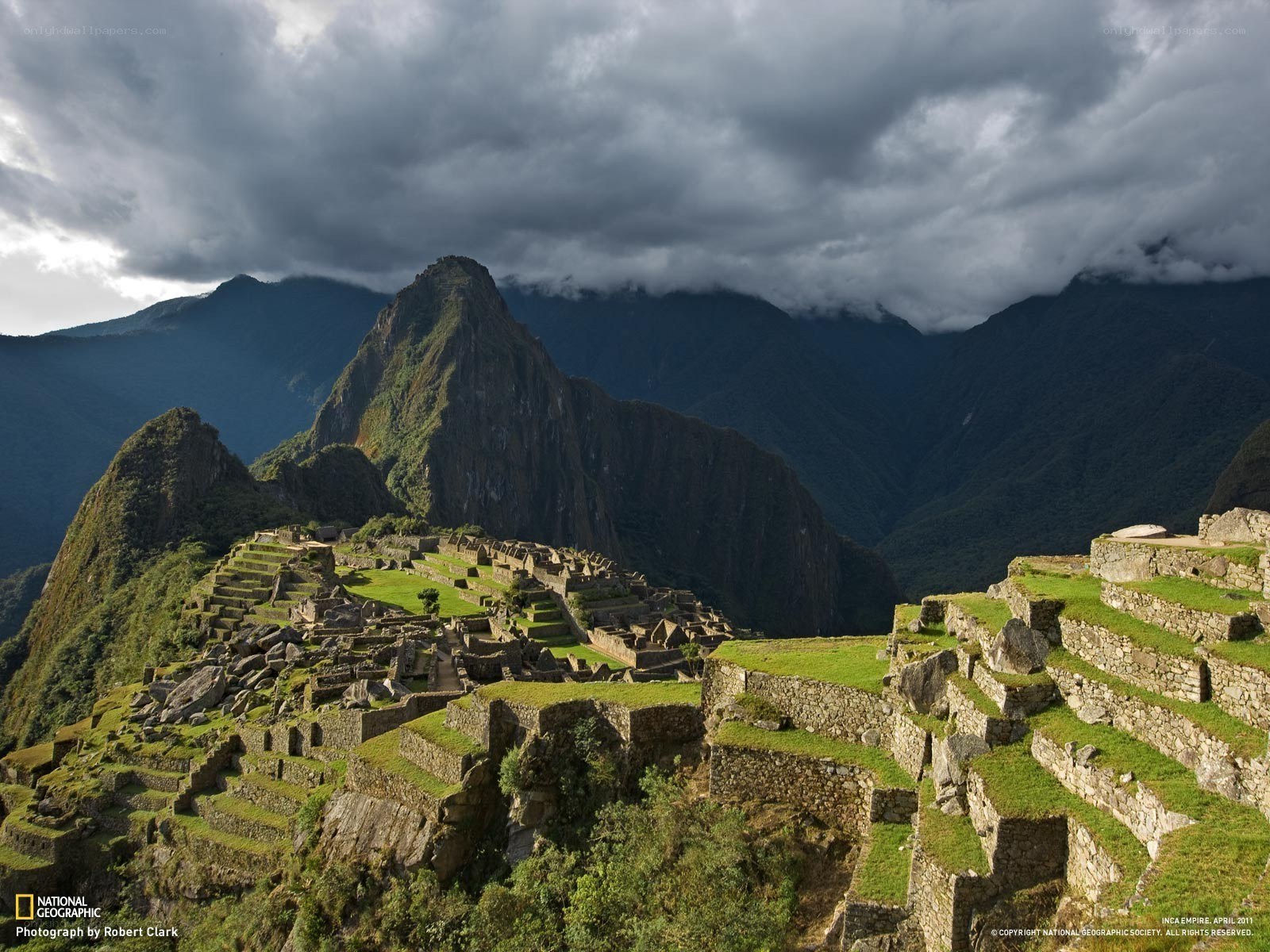 Machu Picchu under stormy sky