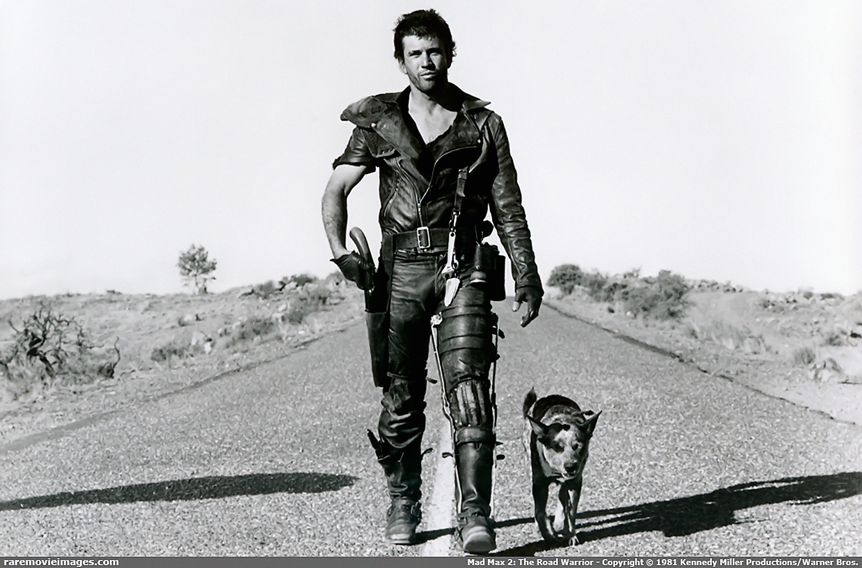 Mad Max walking with dog