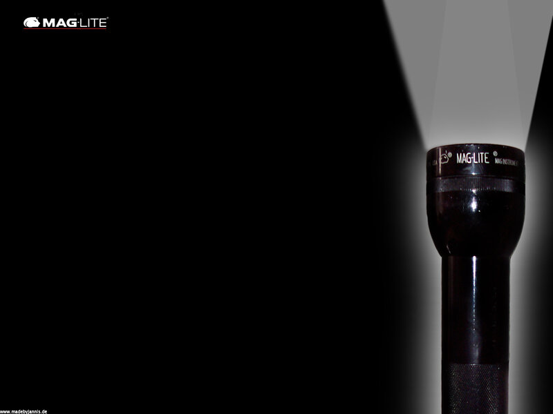 Mag-Lite flashlight in darkness