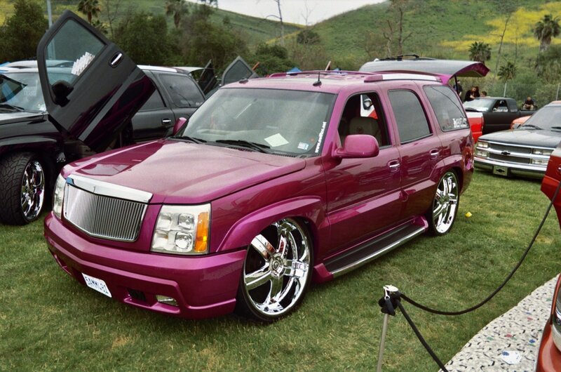 Magenta Cadillac Suv