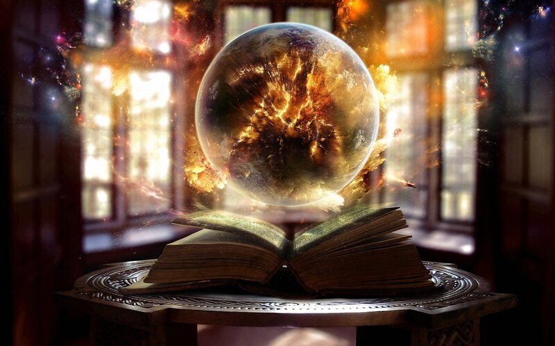 magic book with crystal ball