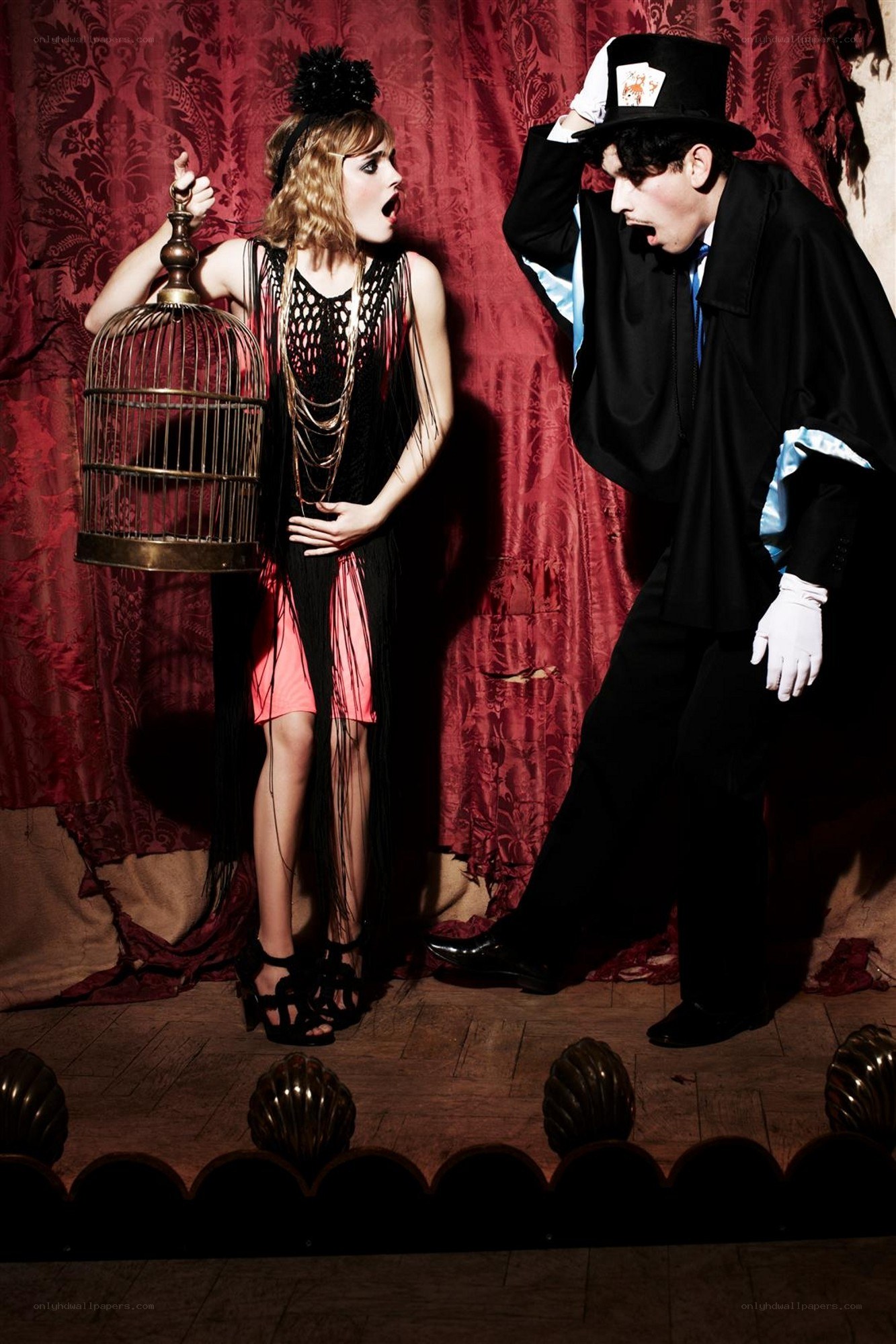 Magician and performer on stage