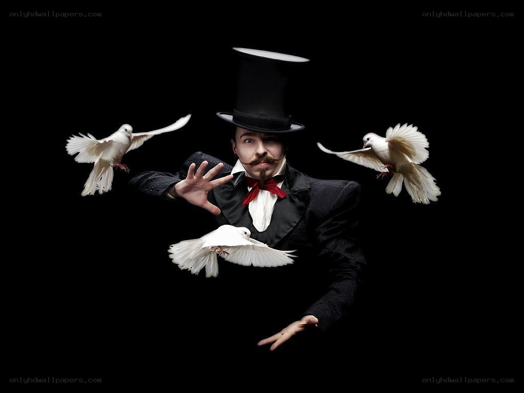 magician with white doves