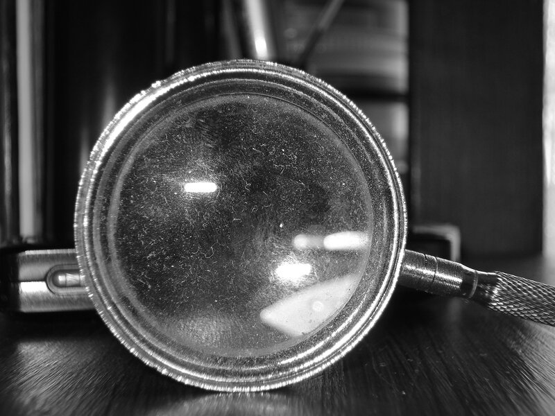 magnifying glass on a table