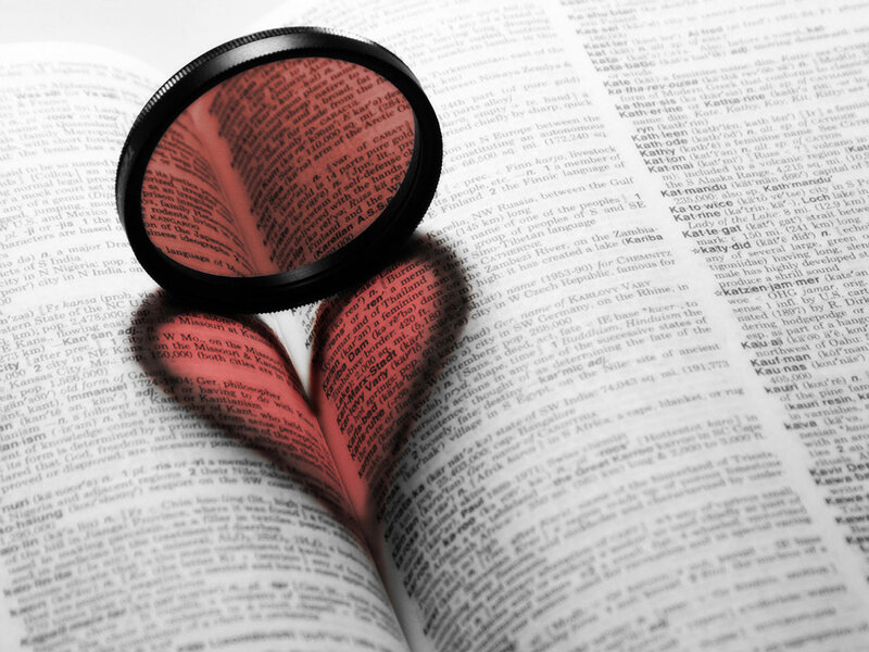 Magnifying Glass on Book — Black