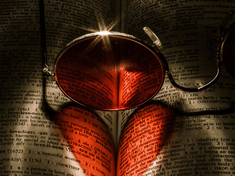 Magnifying Glass on Book — Brown, Dramatic