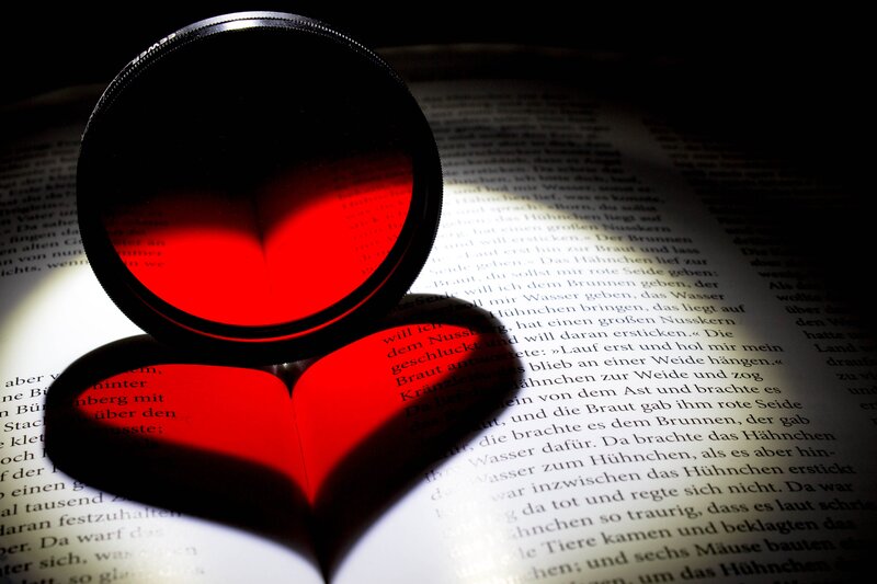magnifying glass on book page
