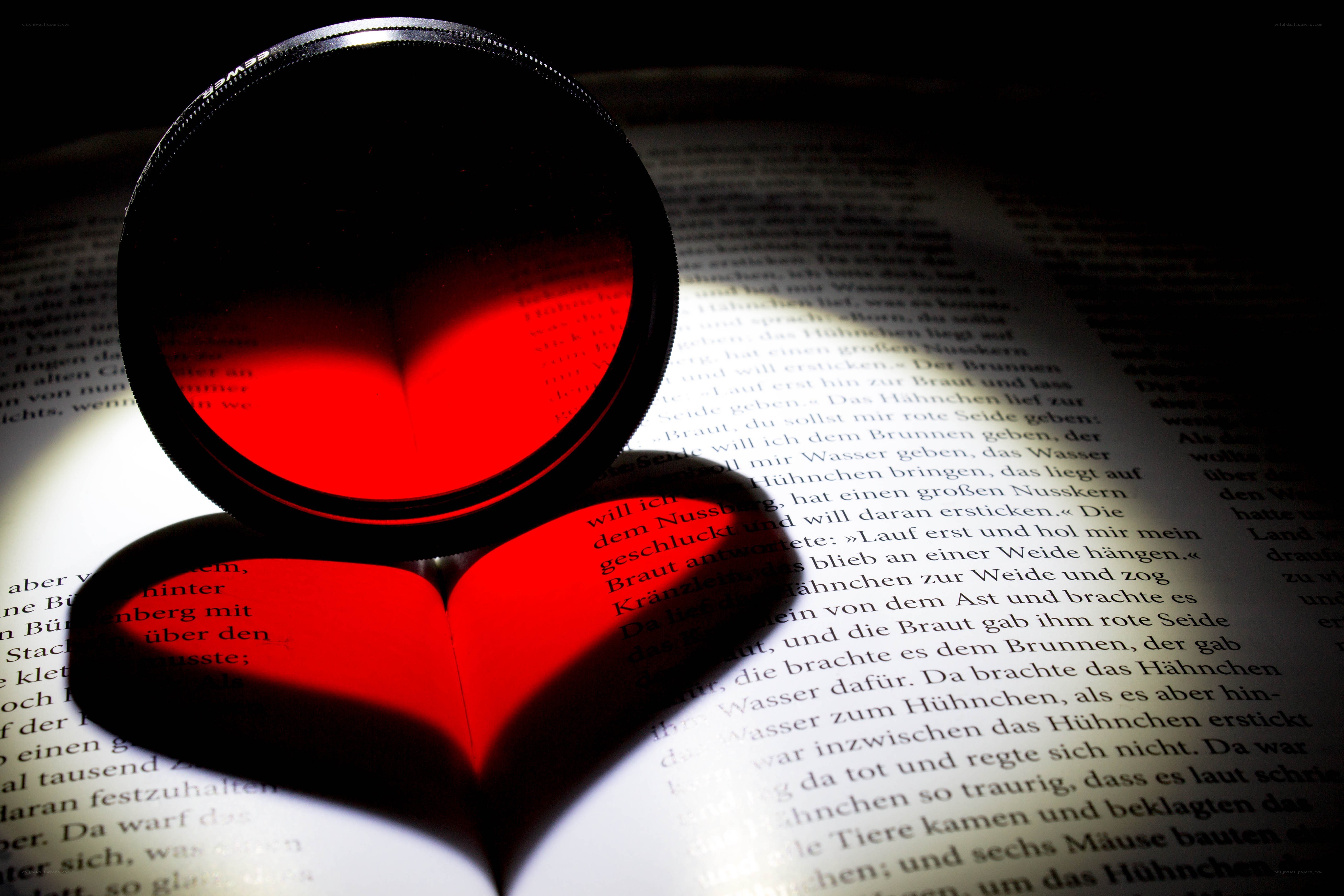 magnifying glass on book page