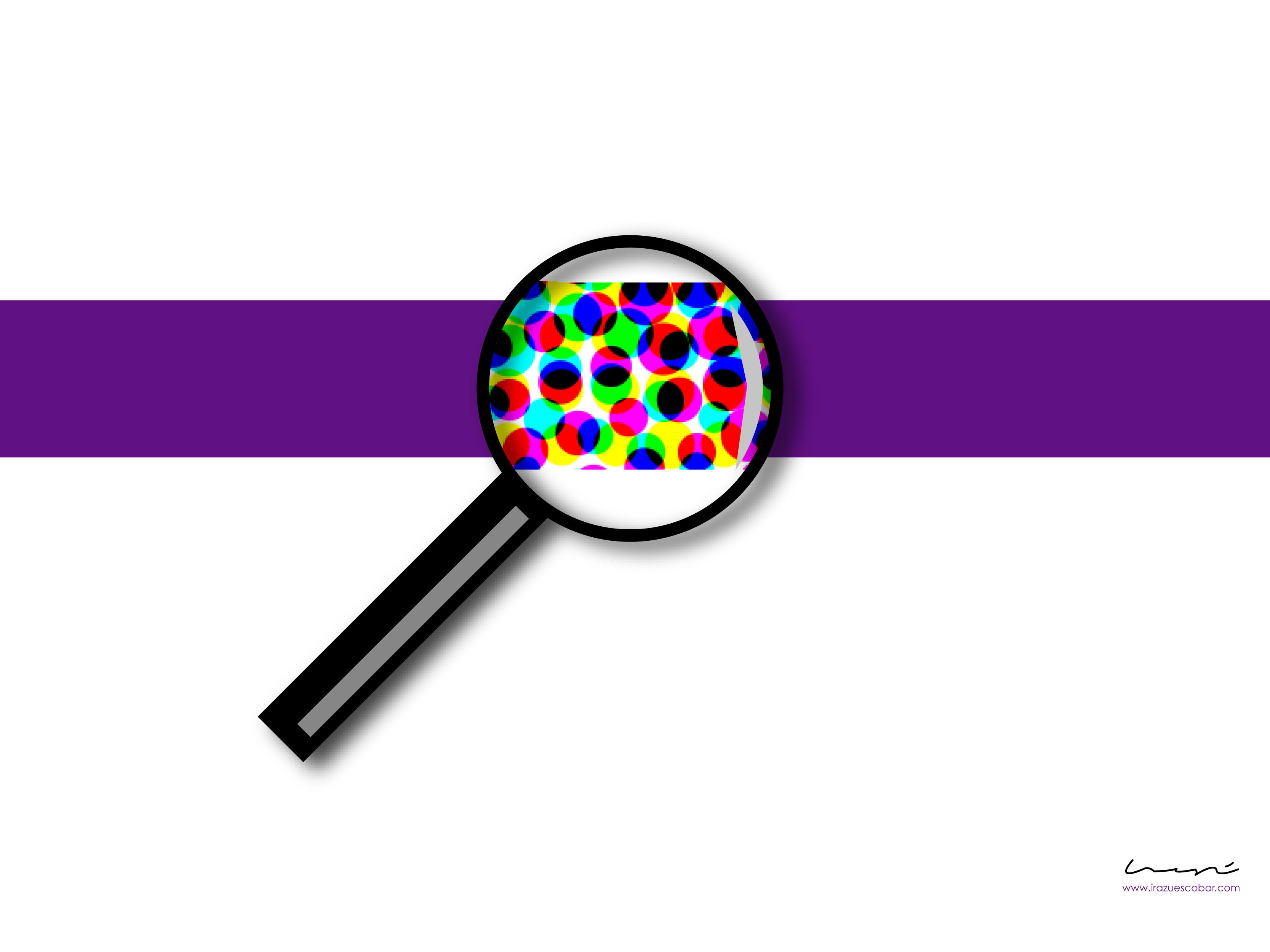 magnifying glass over colorful pattern