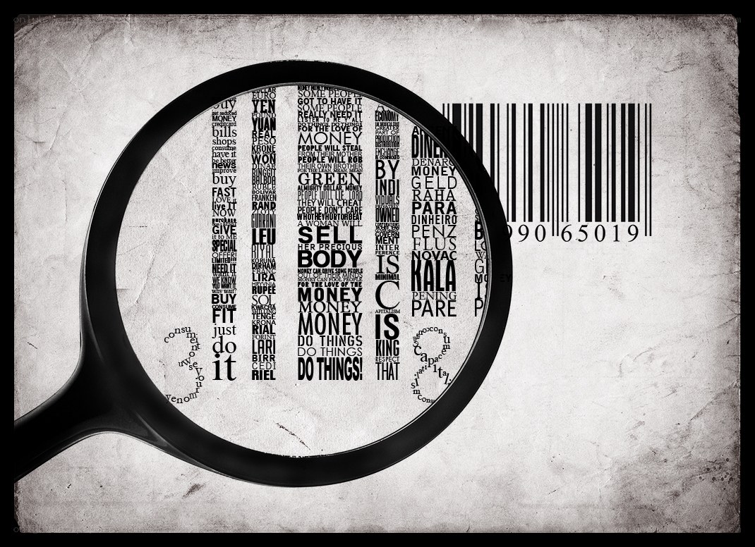 magnifying glass over money text