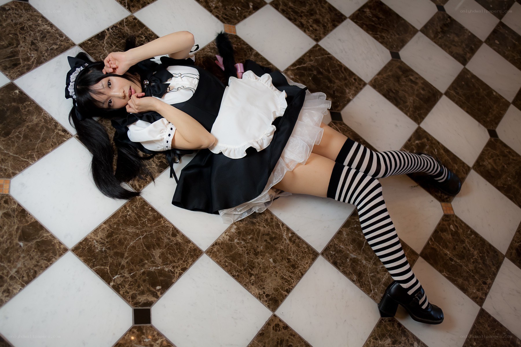 maid cosplayer on floor