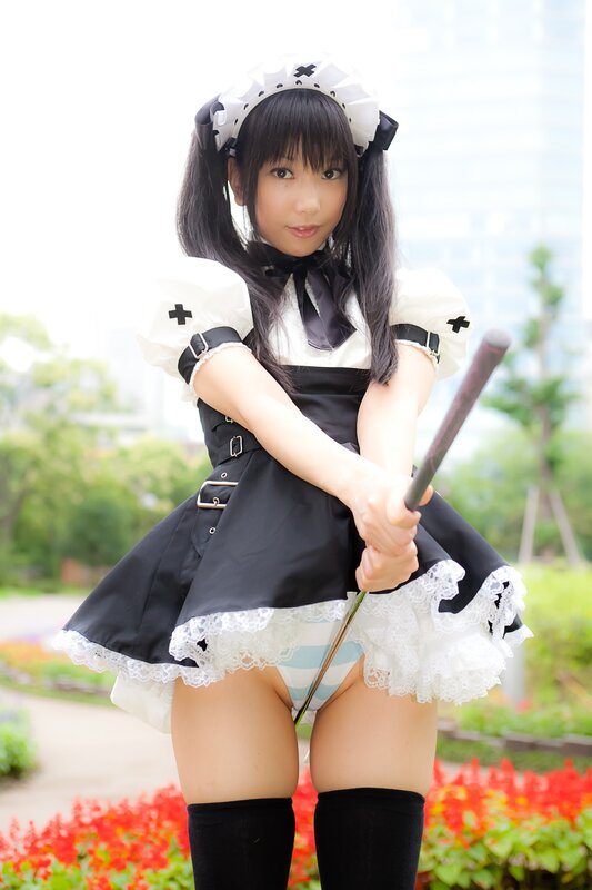 maid cosplayer with baton
