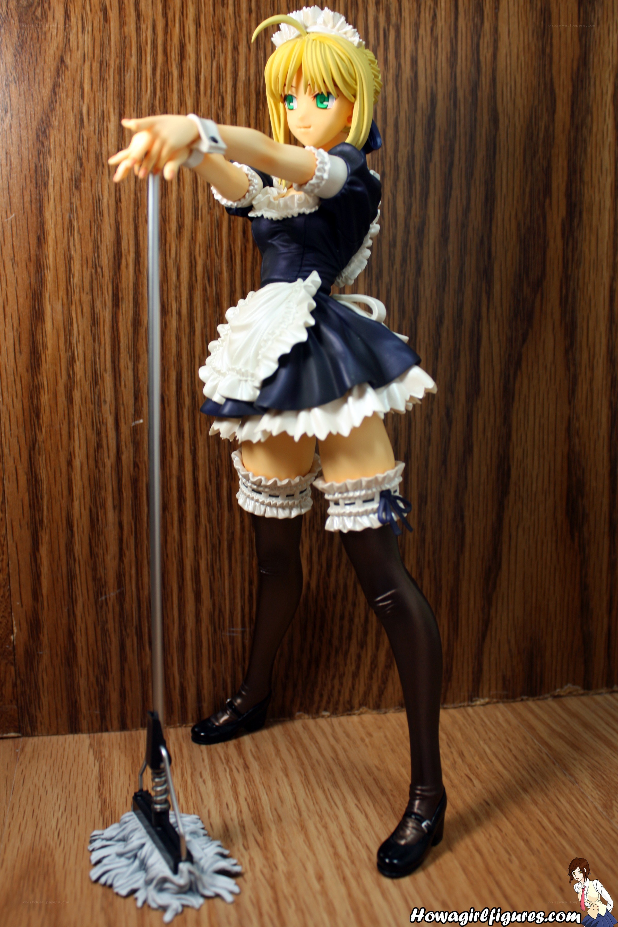 maid figurine with mop