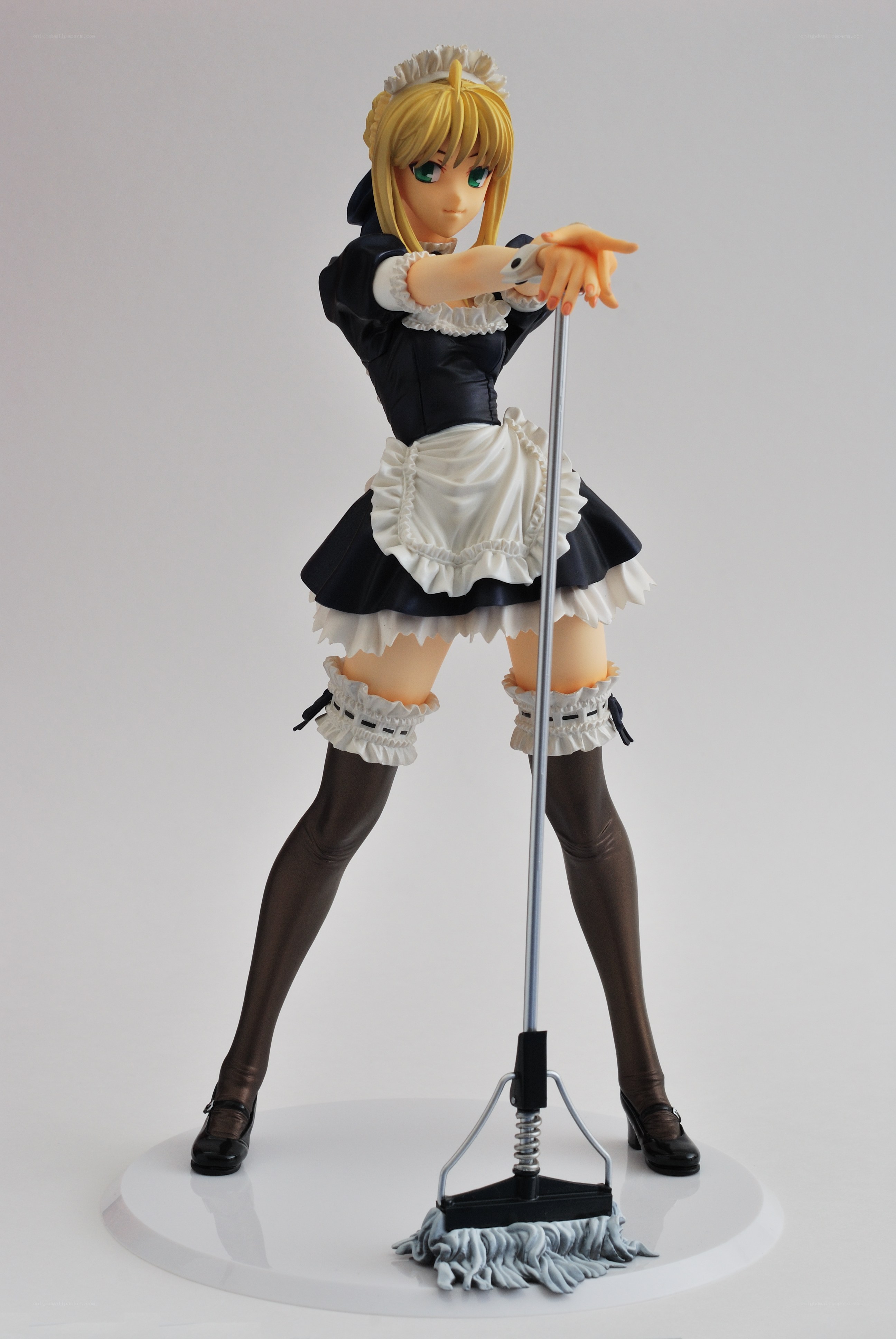 maid figurine with mop