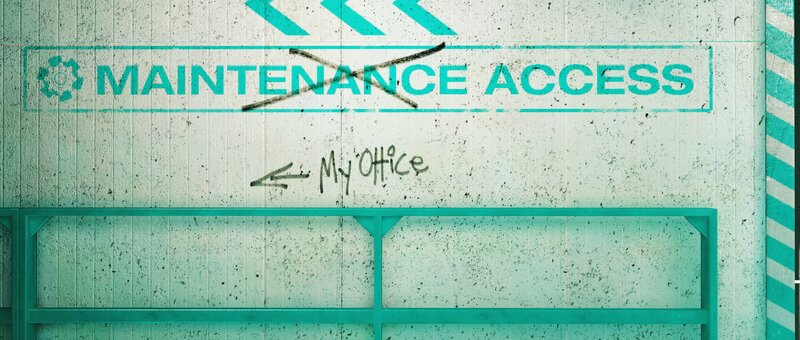maintenance access sign with graffiti