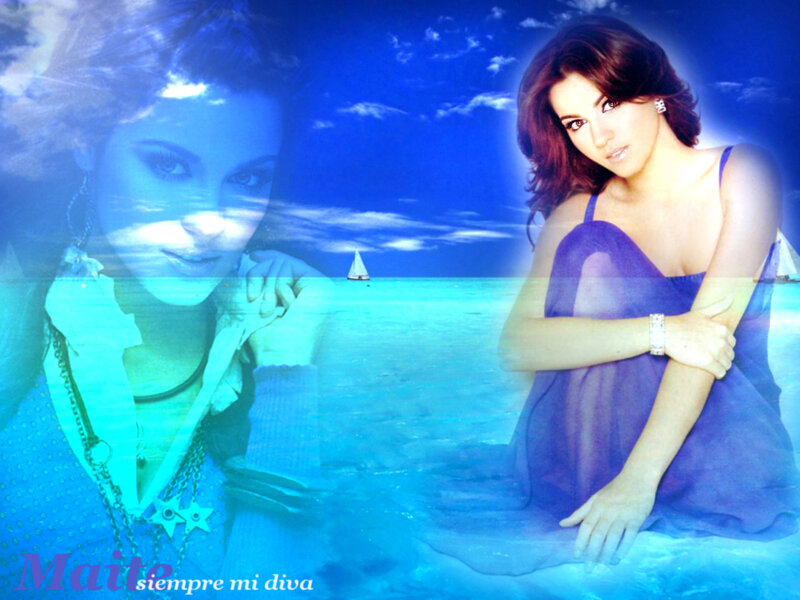Maite in blue beach scene