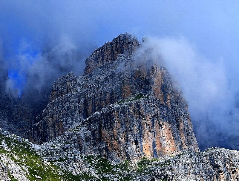 Majestic mountain peak shrouded in mist
