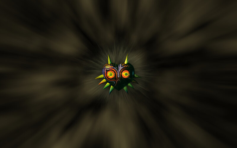 Majora's Mask glowing in darkness