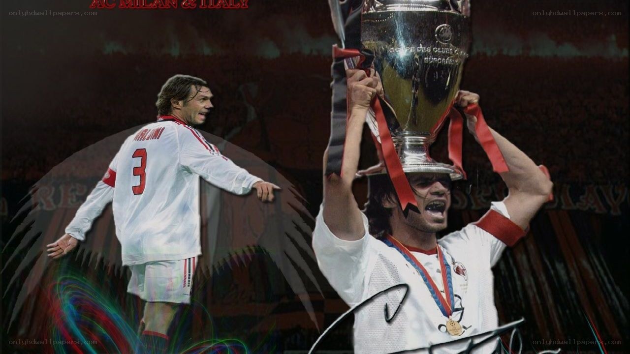 Maldini celebrates with trophy