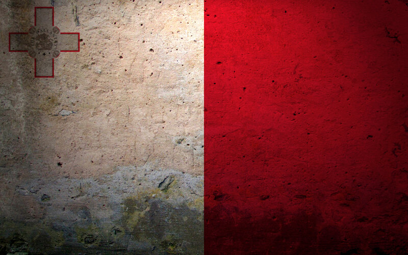 Maltese flag on textured wall