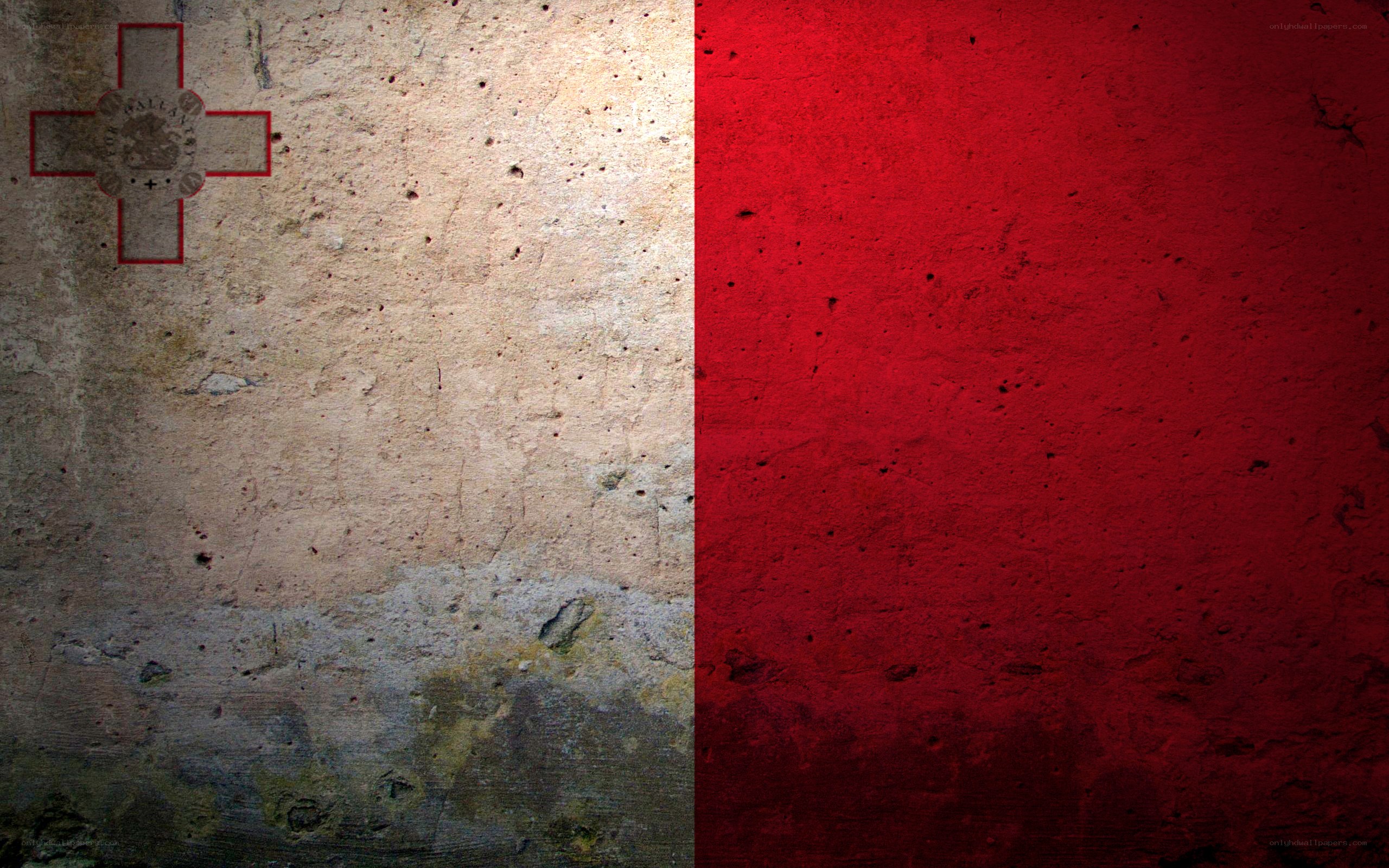 Maltese flag on textured wall