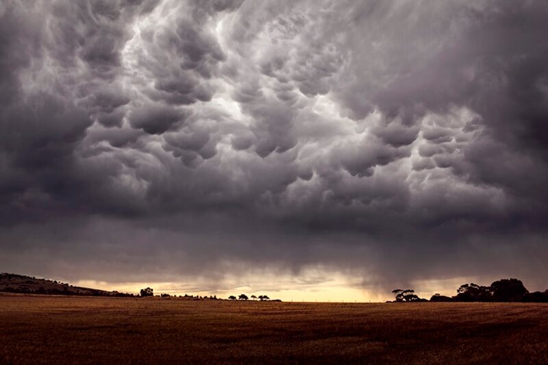 Mammatus Clouds over Field — Gray