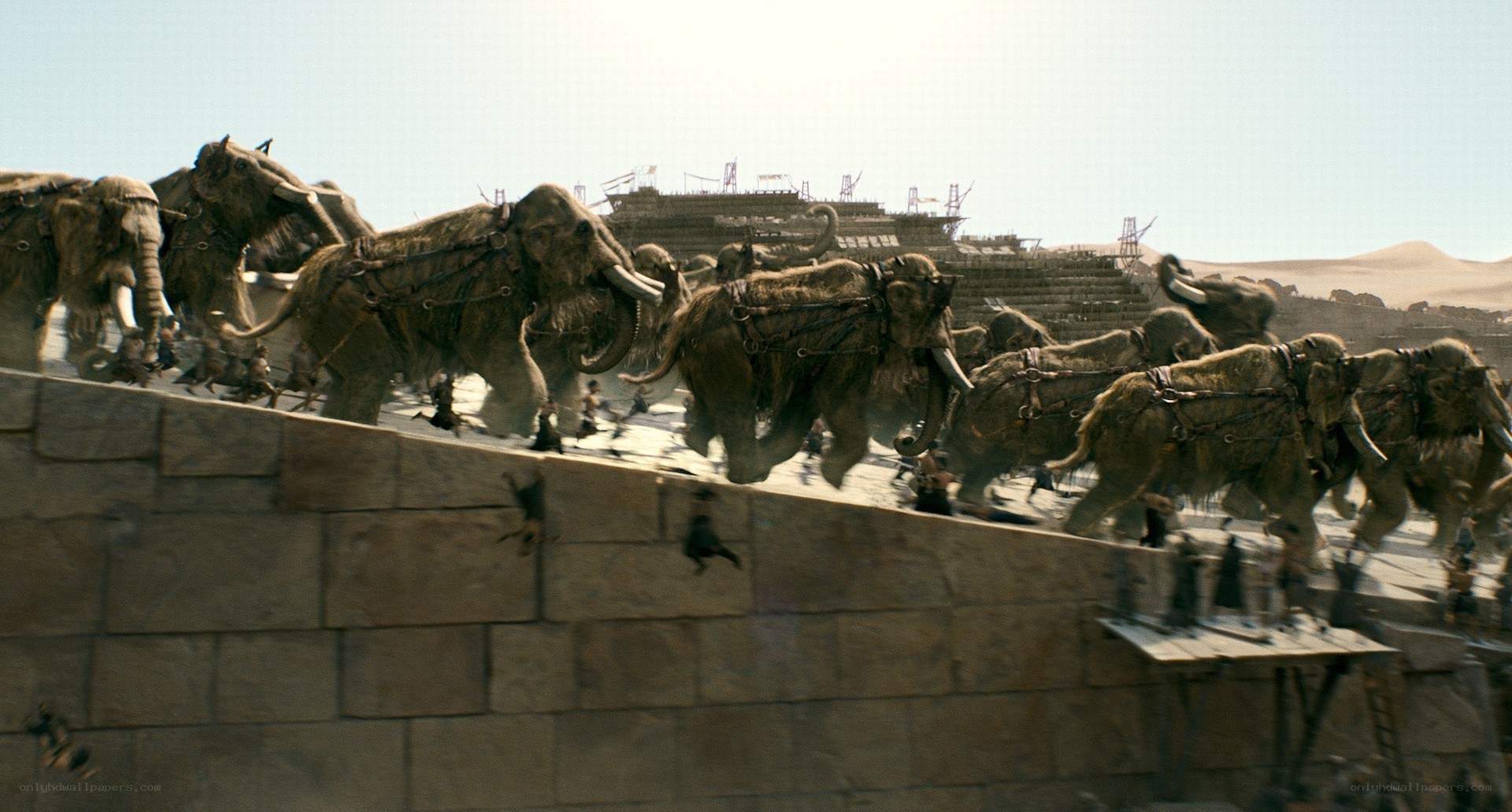 Mammoths attacking a city
