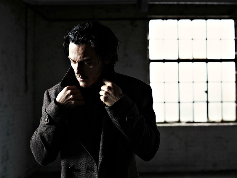 Man Adjusting Coat