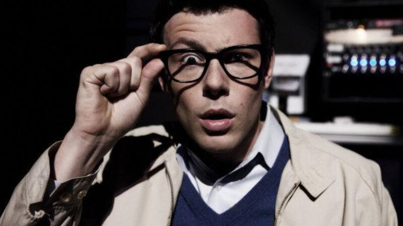 Man Adjusting Glasses — Black