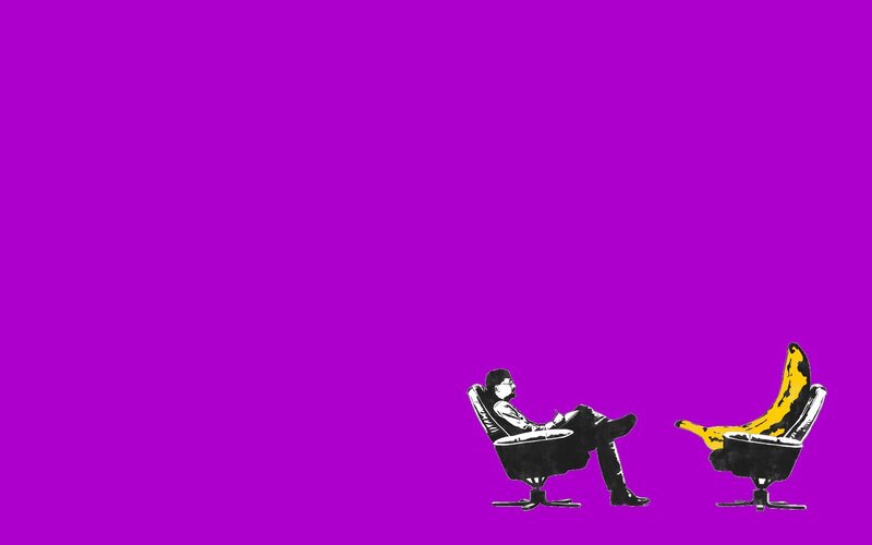 Man and banana in chairs