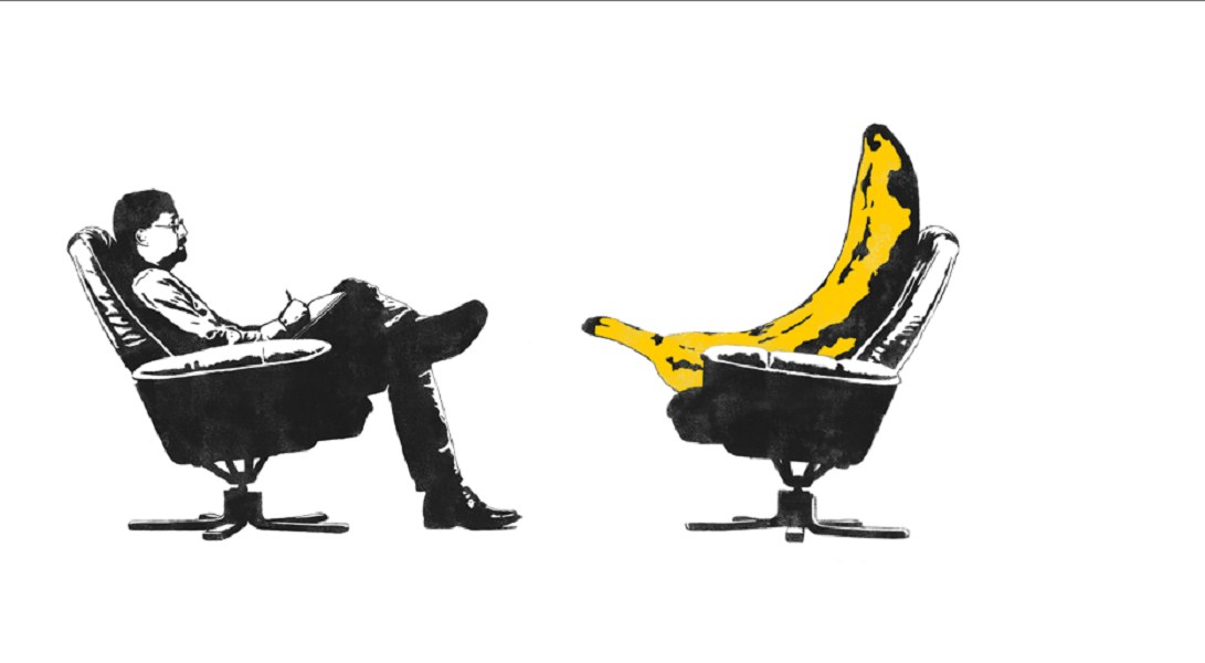 man and banana in chairs