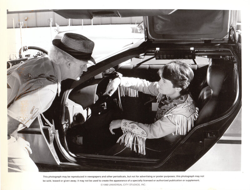 man and boy in car