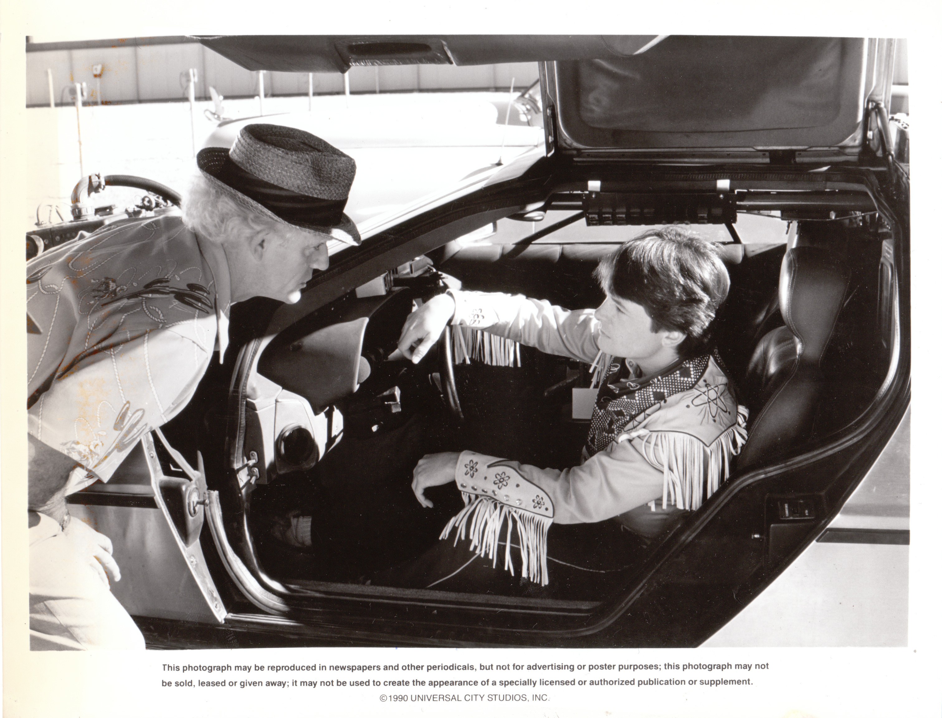 man and boy in car