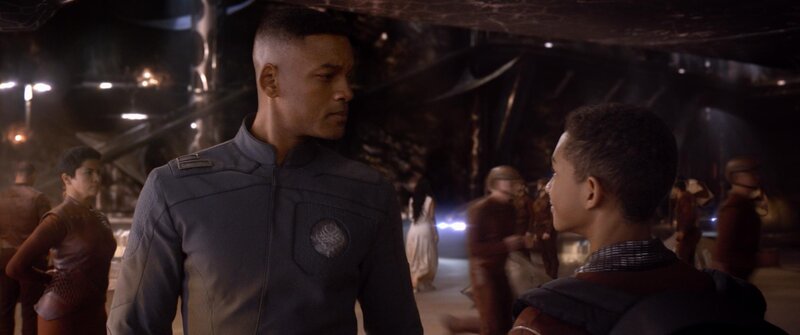 man and boy in futuristic setting