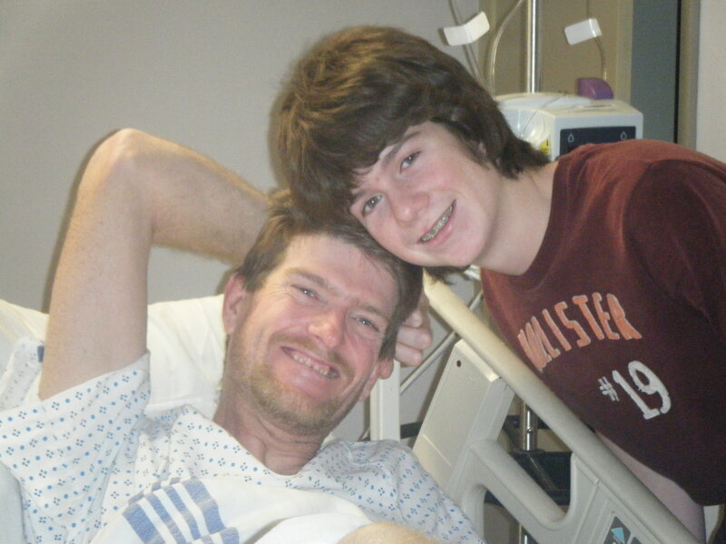 Man and boy in hospital room