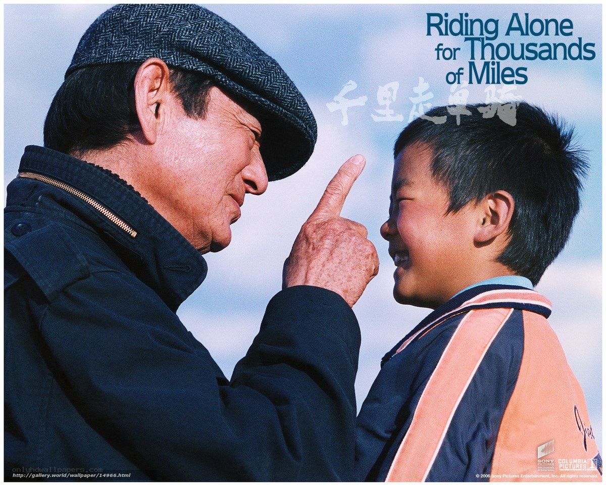 man and boy on a journey