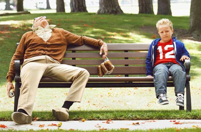 Man and boy on park bench