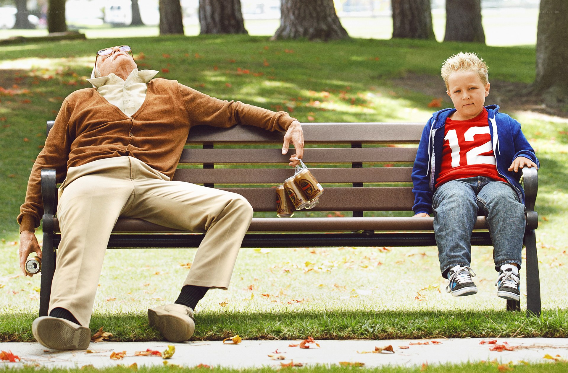 Man and boy on park bench